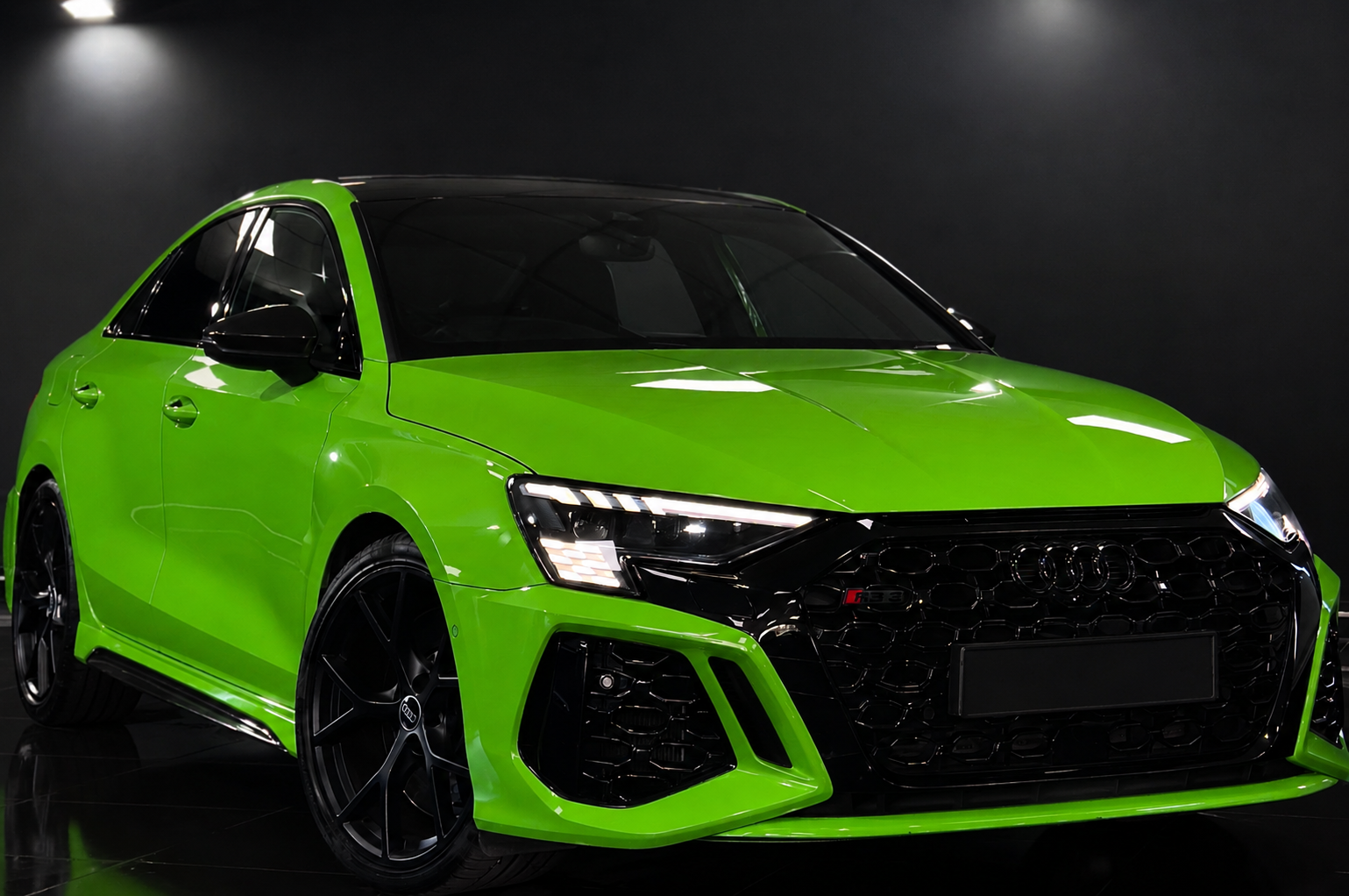 Green Audi RS3 front view